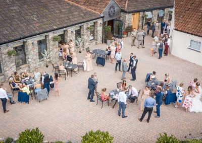 aerial view of wedding in the courtyard at Aldwick Estate